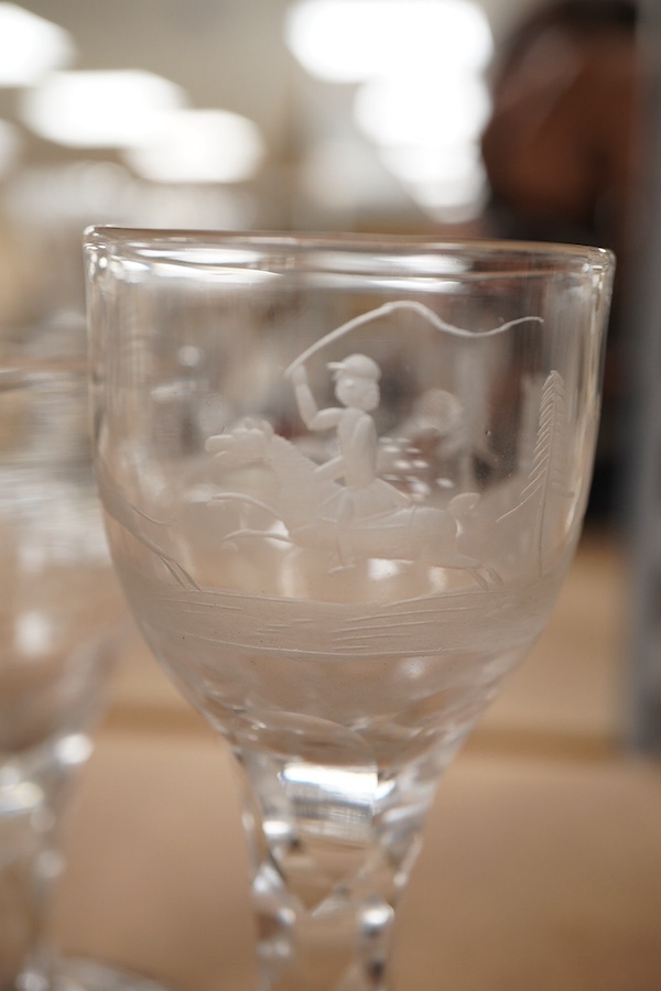Four Georgian wine glasses, three with engraved bowls, three with faceted stems, and one with an air twist knopped stem and stepped foot, tallest 16cm
